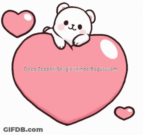 Teddy Bear Sitting On Pink Heart GIF