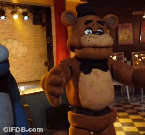 Teddy Bear Standing On Checkerboard Floor GIF