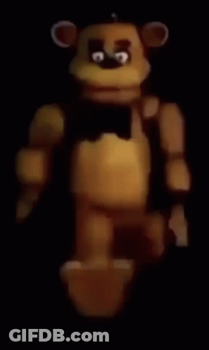 Teddy Bear With Black Bow Tie In Dark GIF