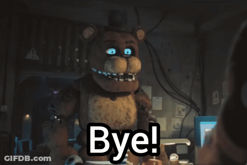 Teddy Bear With Blue Eyes Saying Bye In Dark Room GIF