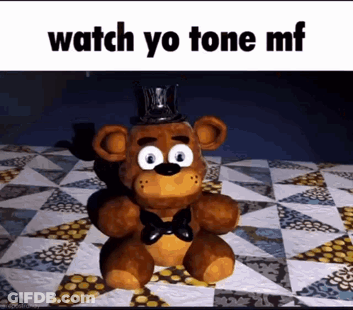 Teddy Bear With Top Hat And Bow Tie On Quilt GIF