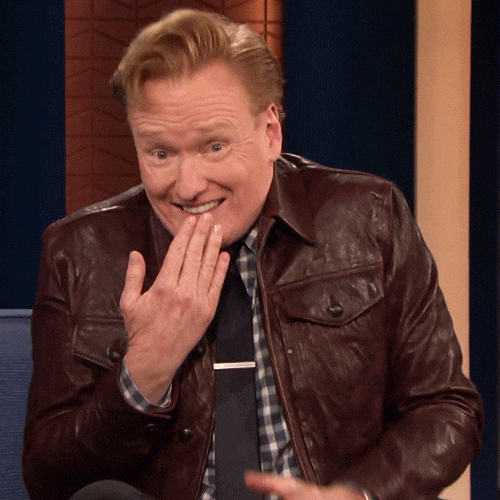 Tee Hee Conan O'Brien Giggling GIF