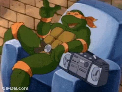 Teenage Mutant Ninja Turtle Sitting In Chair With Boombox GIF