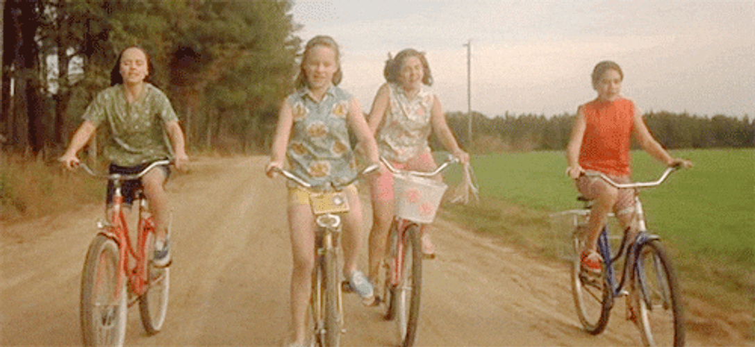 Teenagers Riding Bike Together GIF