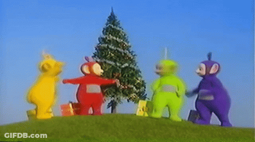 Teletubbies Decorating Christmas Tree On Hill GIF