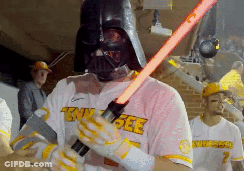 Tennessee Baseball Player In Darth Vader Mask Holding Lightsaber GIF
