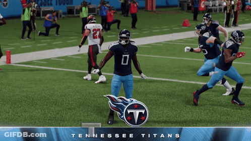 Tennessee Titans Players On Field With Logo GIF
