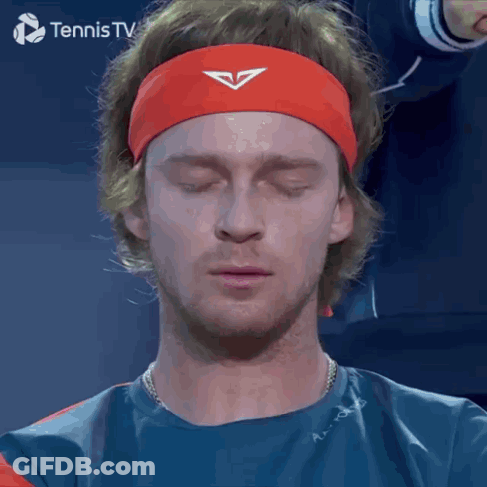 Tennis Player Eyes Closed Headband With V GIF