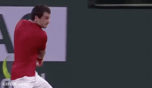 Tennis Player Hitting Ball With Rolex Ad GIF