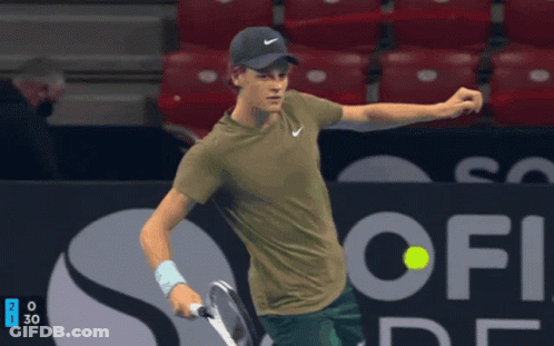 Tennis Player Holding Racket And Sof Sign GIF