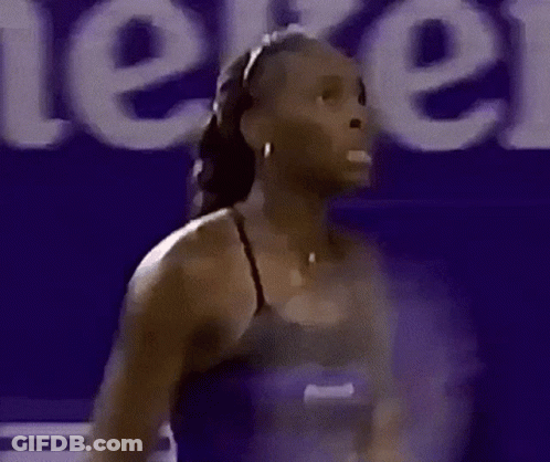 Tennis Player In Front Of Asheville Banner GIF
