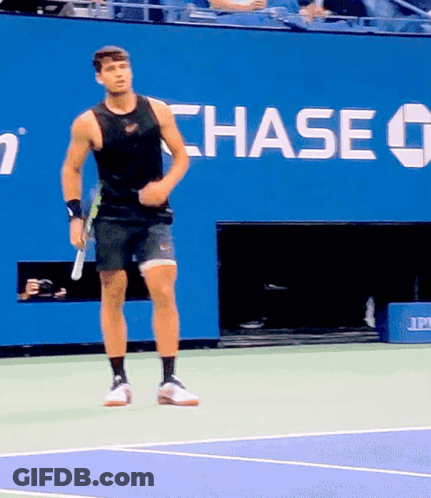 Tennis Player In Front Of Chase Bank Sign GIF