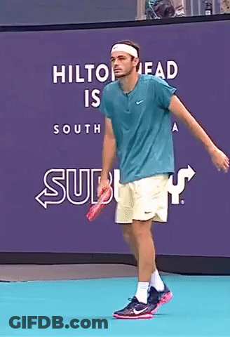 Tennis Player In Front Of Hilton Head South Sign GIF