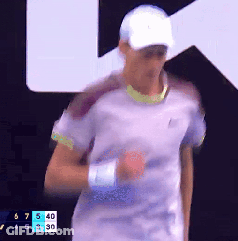 Tennis Player In White Hat And Purple Shirt GIF