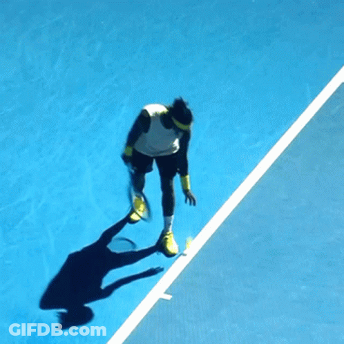 Tennis Player Jumping Holding Racquet GIF