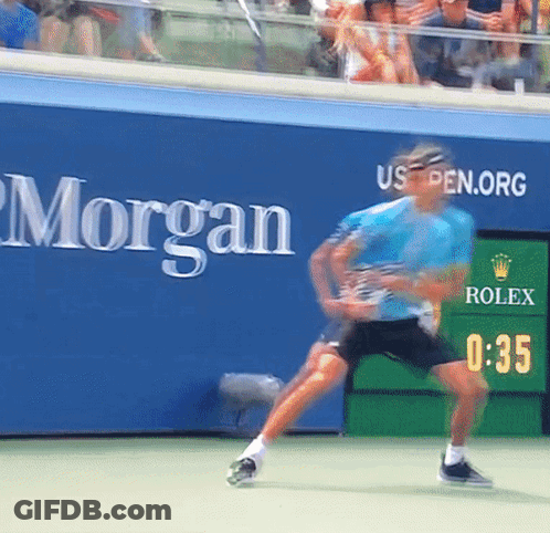 Tennis Player Playing In Front Of Morgan Sign GIF