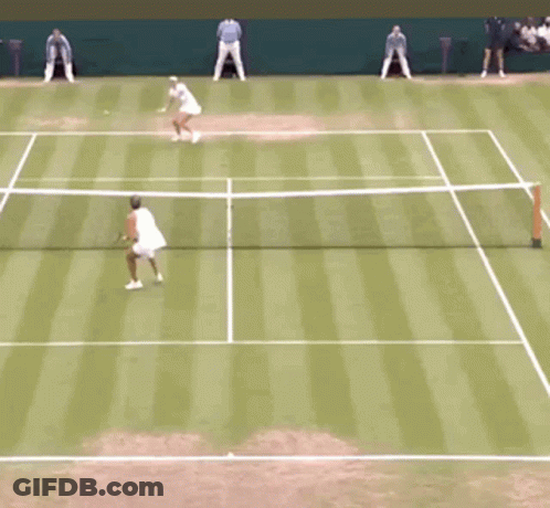 Tennis Player Running Towards Net With Racquet GIF