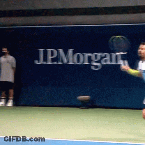 Tennis Player Swinging Racket GIF