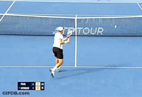 Tennis Player Swinging Racket On Court With AT&T Tour Sign GIF
