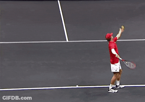 Tennis Player Swinging Racket On Court With AT&T Tour Sign GIF