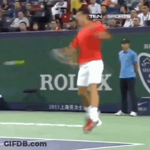 Tennis Player Swinging Racket With Rolex Ad GIF