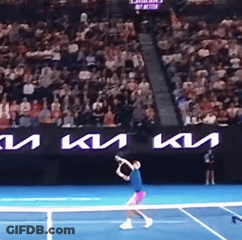 Tennis Player Swinging Racquet In Front Of Kia Ad GIF