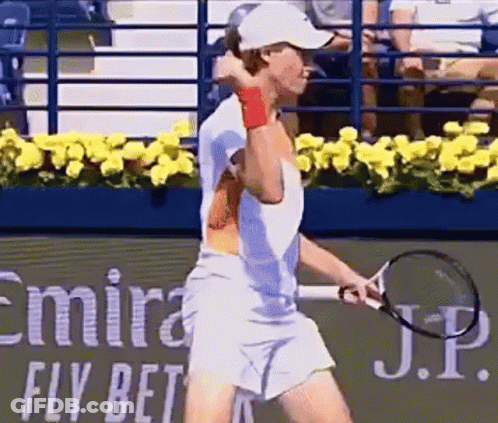 Tennis Player Swinging Racquet In Front Of Kia Ad GIF