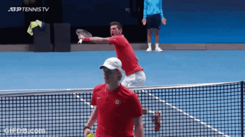 Tennis Player With Ball And Emirates Better Sign GIF
