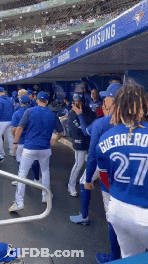 Teoscar Hernandez Greetings With Teammates GIF