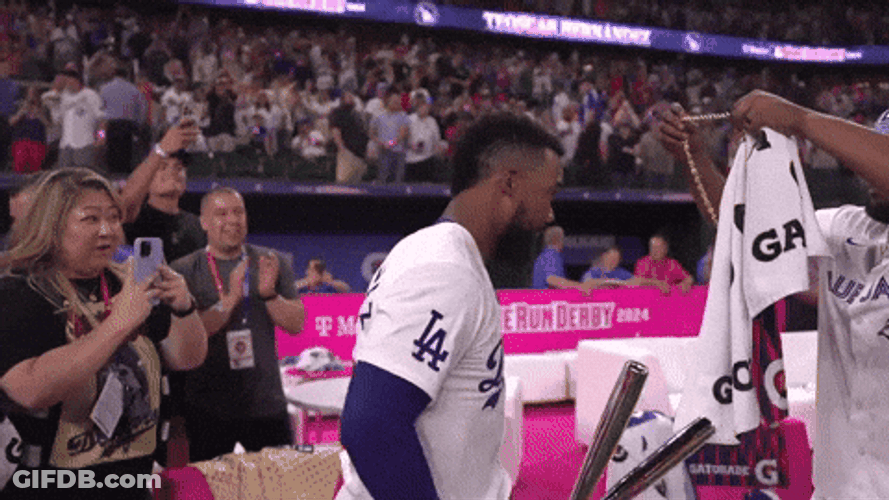 Teoscar Hernandez Wears Necklace As Welcome Treat GIF