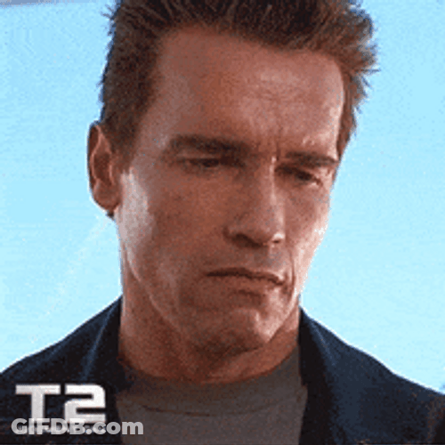Terminator Arnold Schwarzenegger Gritted Teeth Smile GIF