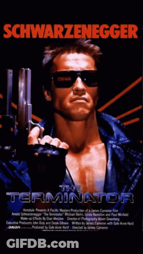 Terminator Arnold Schwarzenegger Holding Gun GIF