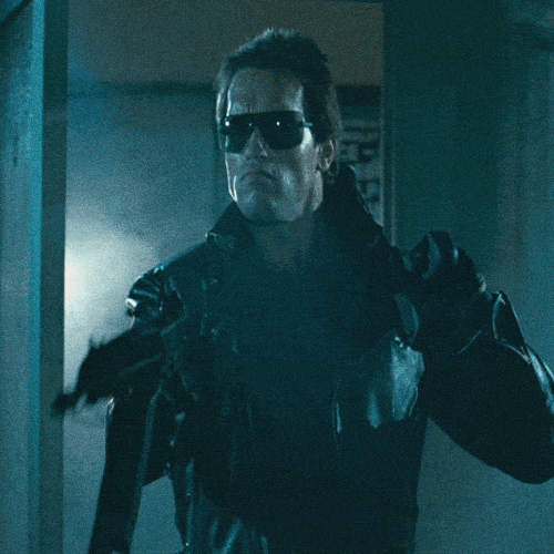 Terminator Arnold Schwarzenegger Shooting Fire GIF