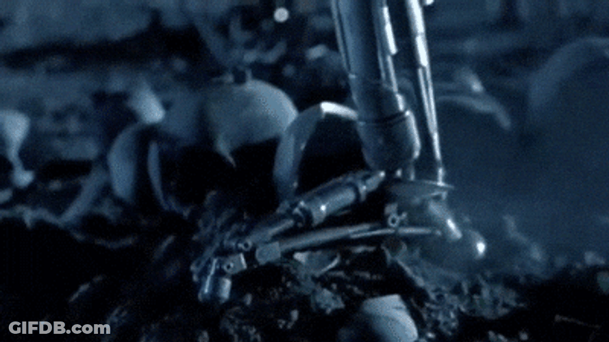 Terminator Skynet Holding A Gun GIF