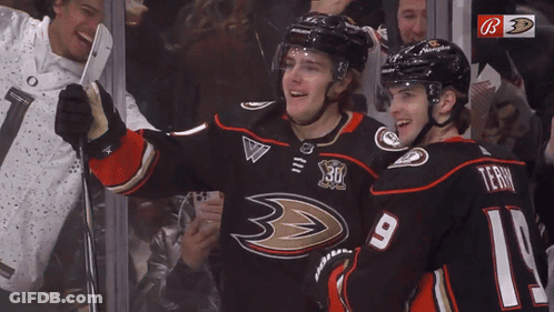 Terry Hugging Another Hockey Player GIF