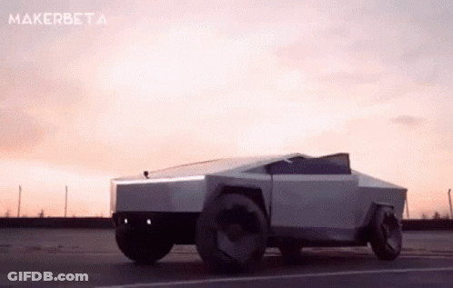 Tesla Cybertruck Driving Down Road GIF