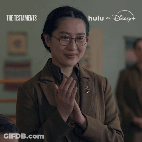 Testaments On Hulu Ad With Glasses Woman GIF