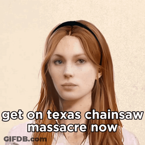Texas Chainsaw Fake Smile Reaction GIF