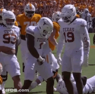 Texas Football Players On Field GIF