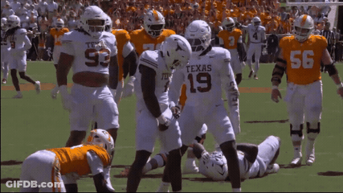 Texas Football Players On Field GIF
