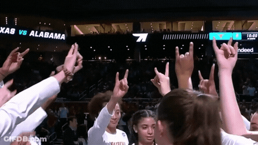 Texas Girls Team Doing Hook Em Sign GIF