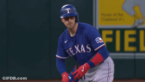 Texas Rangers Baseball Player Wearing Helmet And Gloves GIF