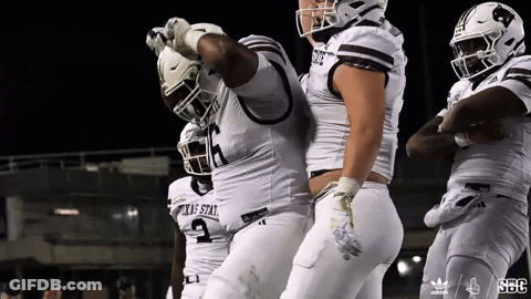 Texas State Football Players Celebrating Touchdown GIF