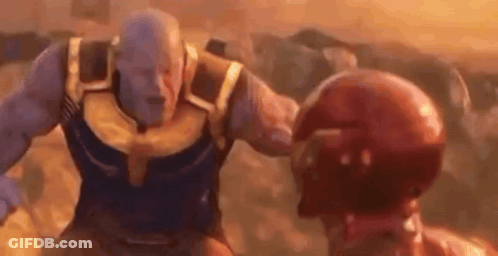 Thanos And Iron Man Are Fighting Each Other In A Movie Scene From Avengers Infinity War . GIF