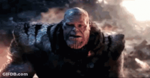Thanos Close Up In Front Of Cloudy Sky GIF