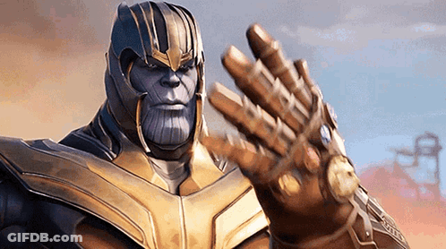 Thanos From Avengers Infinity War Is Wearing A Golden Glove And Making A Peace Sign . GIF