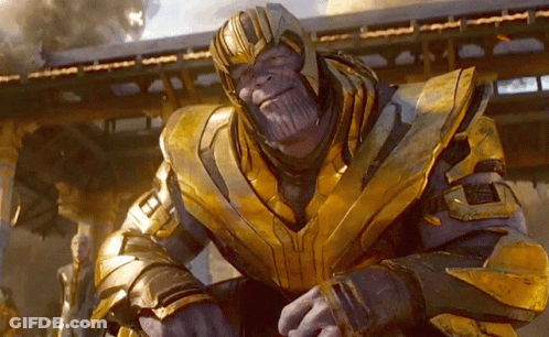 Thanos In Gold And Purple Armor GIF