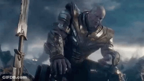 Thanos Is Holding A Sword In His Hand In A Scene From Avengers Endgame . GIF