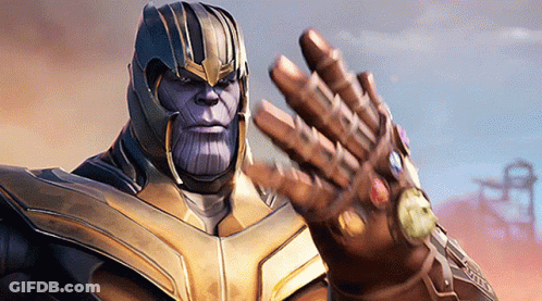 Thanos Is Wearing A Helmet And Holding His Infinity Gauntlet In His Hand GIF