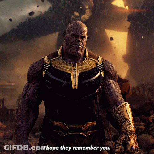 Thanos Says I Hope They Remember You In Front Of A Destroyed City GIF